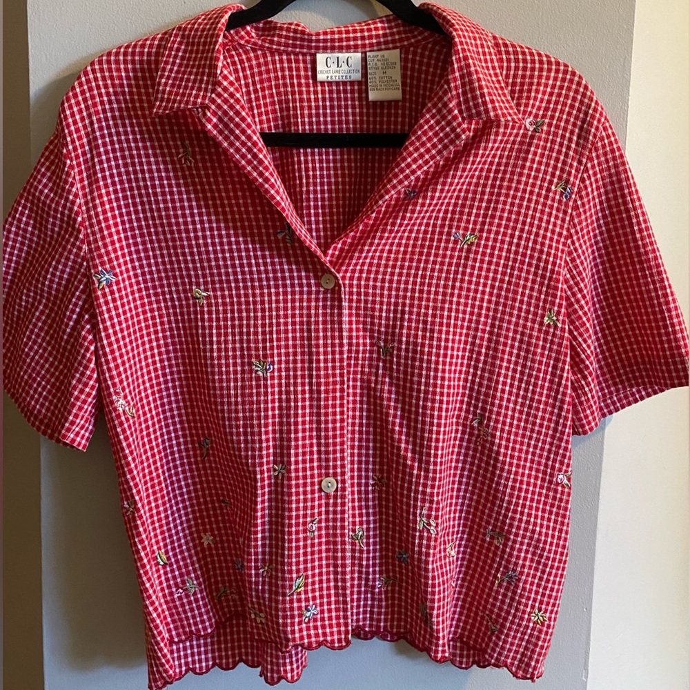 Red & white gingham button down shirt. Small, multicolored flower’s embroidered.